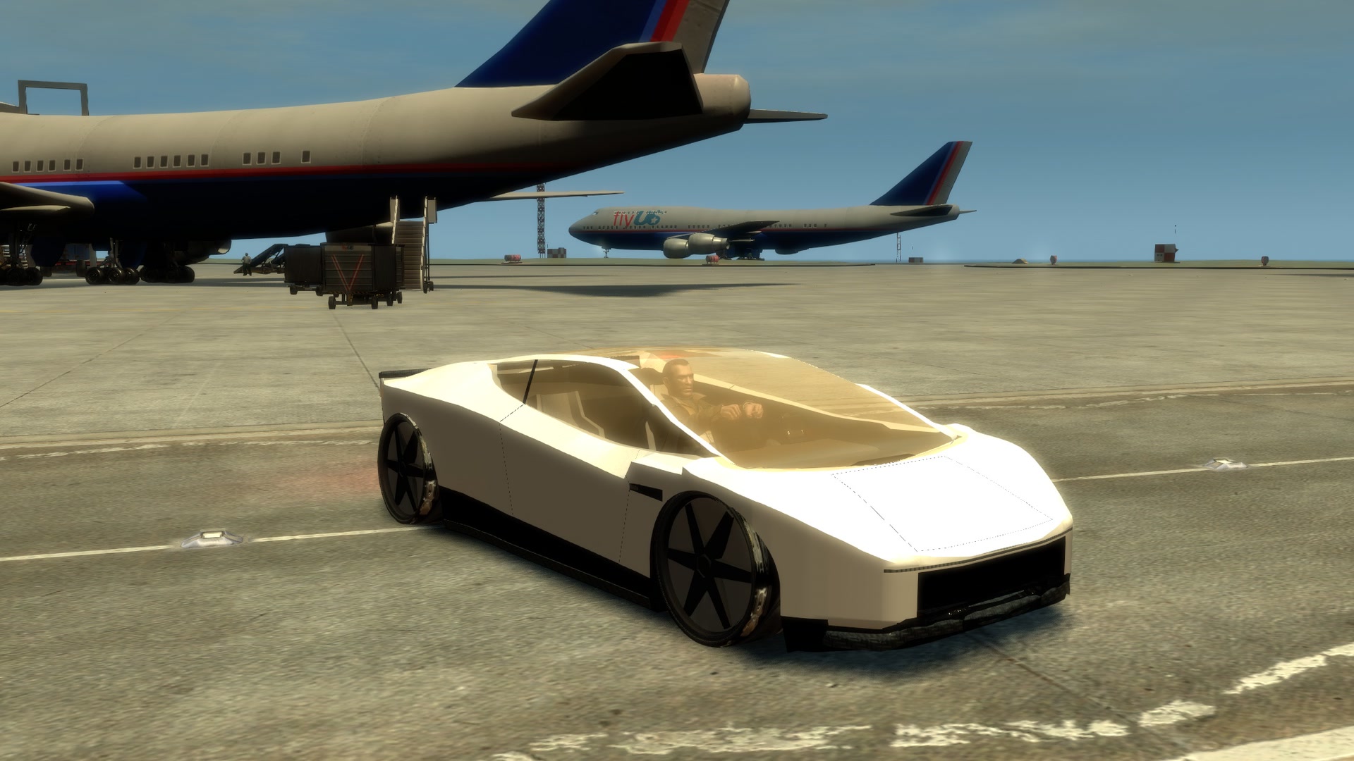 Roadster X on the Francis International apron, 747s behind