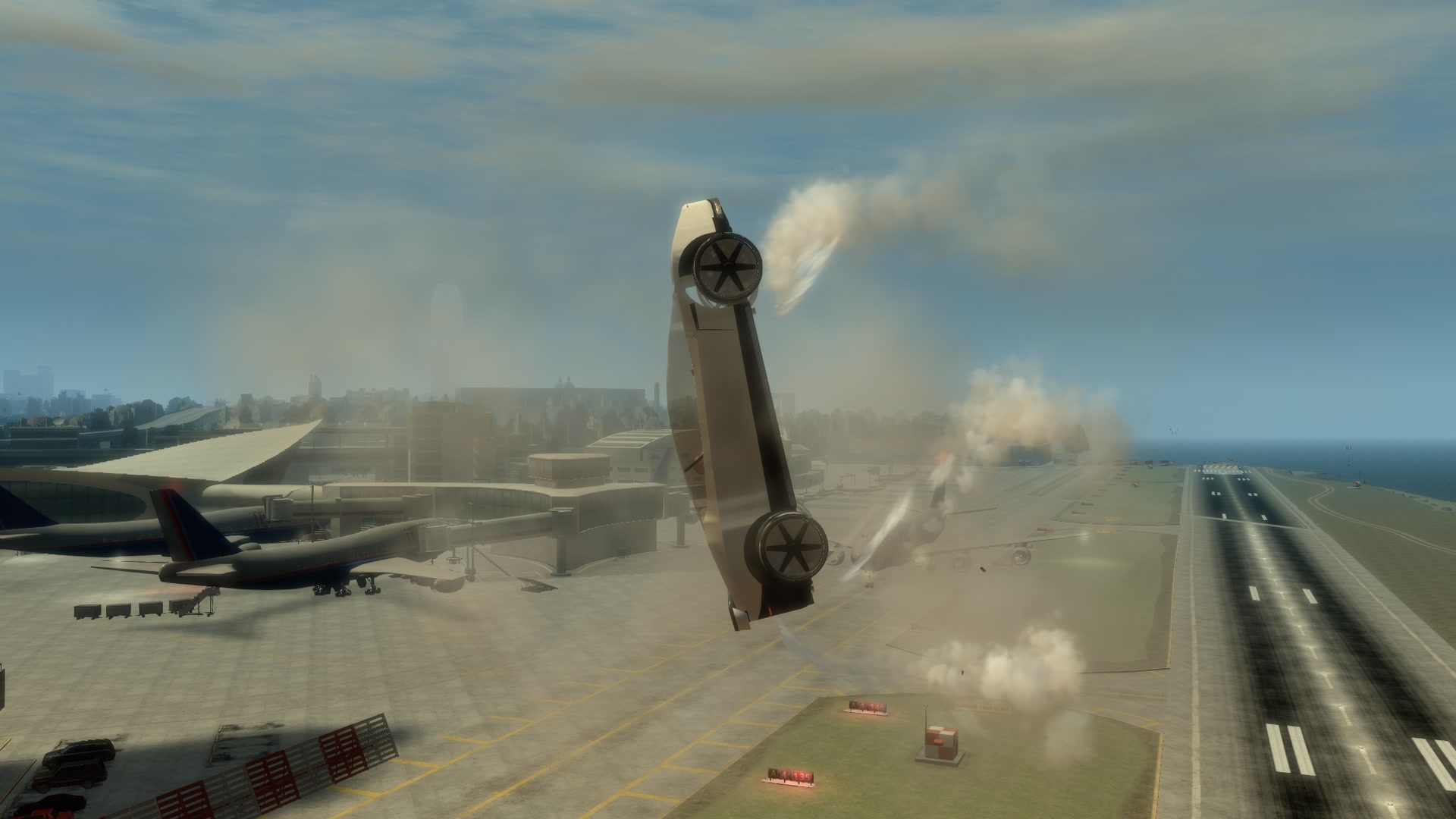 Mid-flip, nose up, the terminal behind